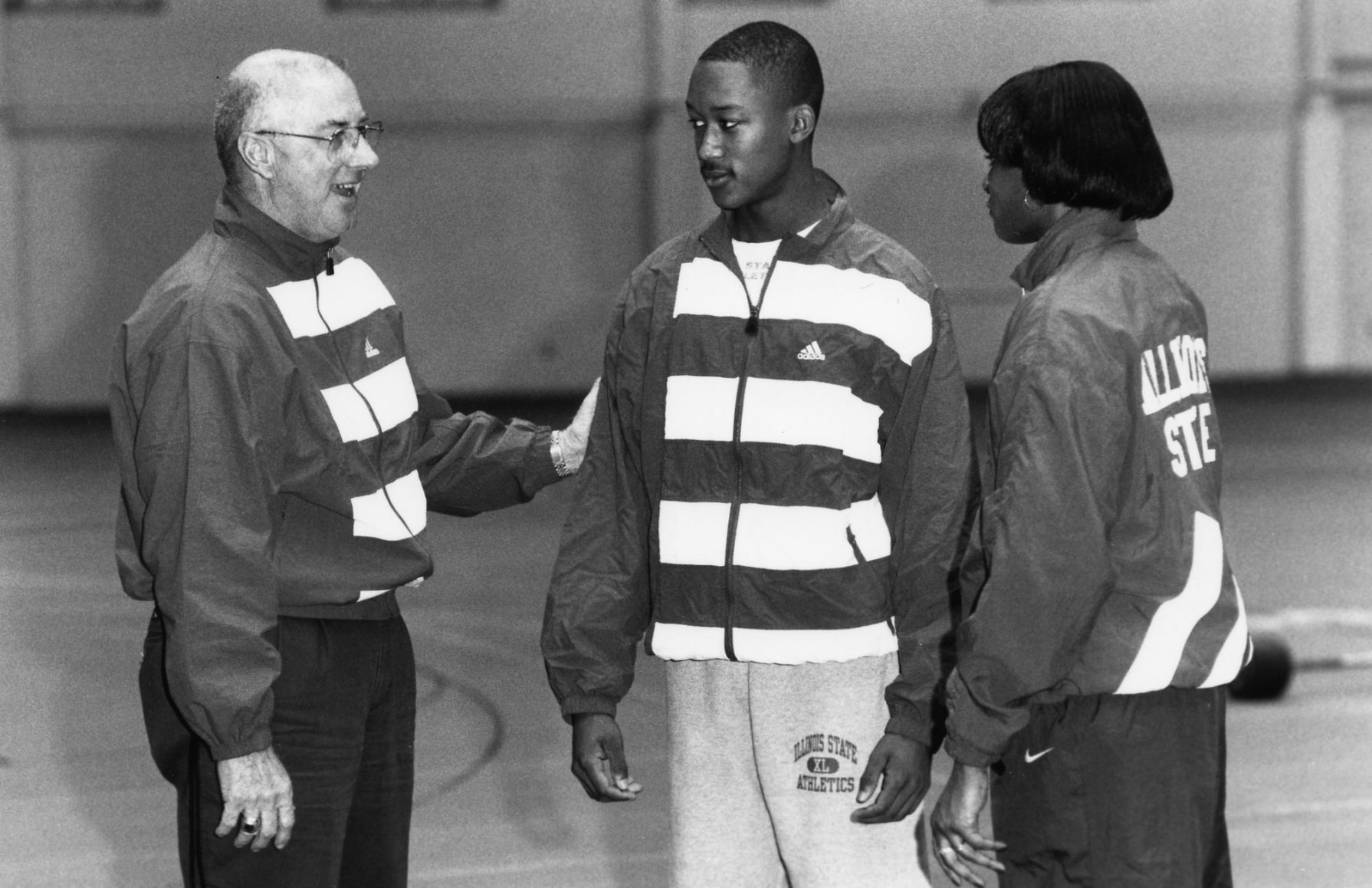 John Coughlan with athletes.jpg
